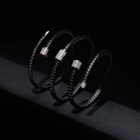 Pulseras titanio y brillantes